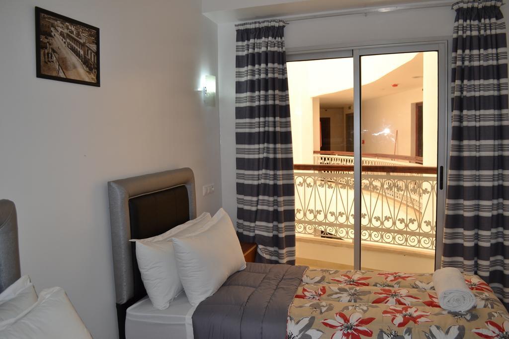 Hotel La Place Эль-Джадида Номер фото